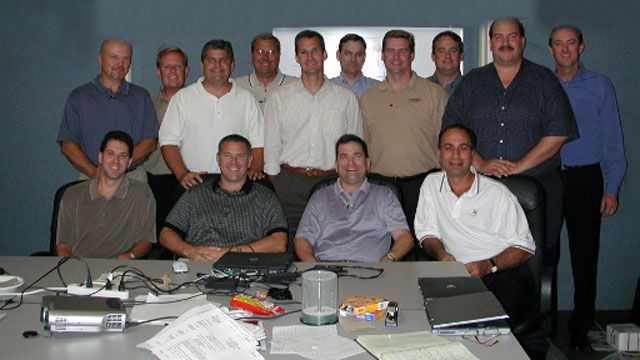 Early convergint colleagues group photo header image