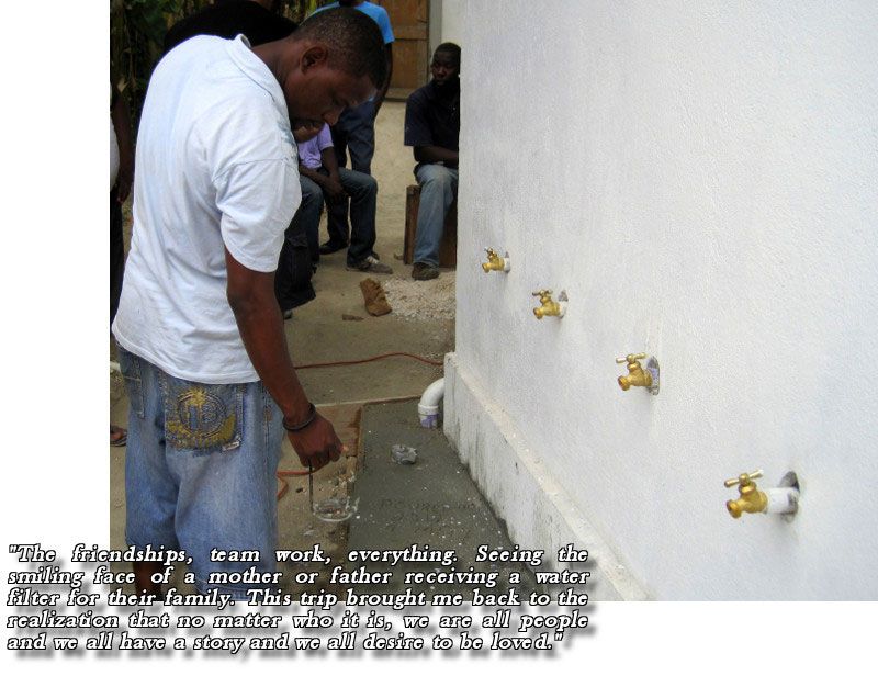 Haiti kid grabbing water from newly done water pumps