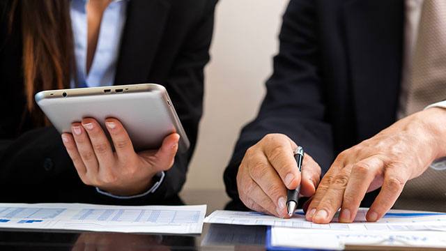 Business people at work in their office