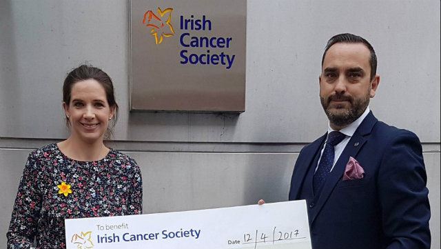Adrian Hill presenting a check to Irish Cancer Society header image