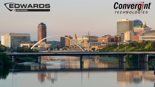 Iowa skyline with logos over it