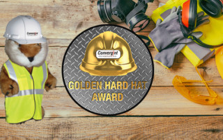 Golden hard hat logo with caddy shack gopher in vest