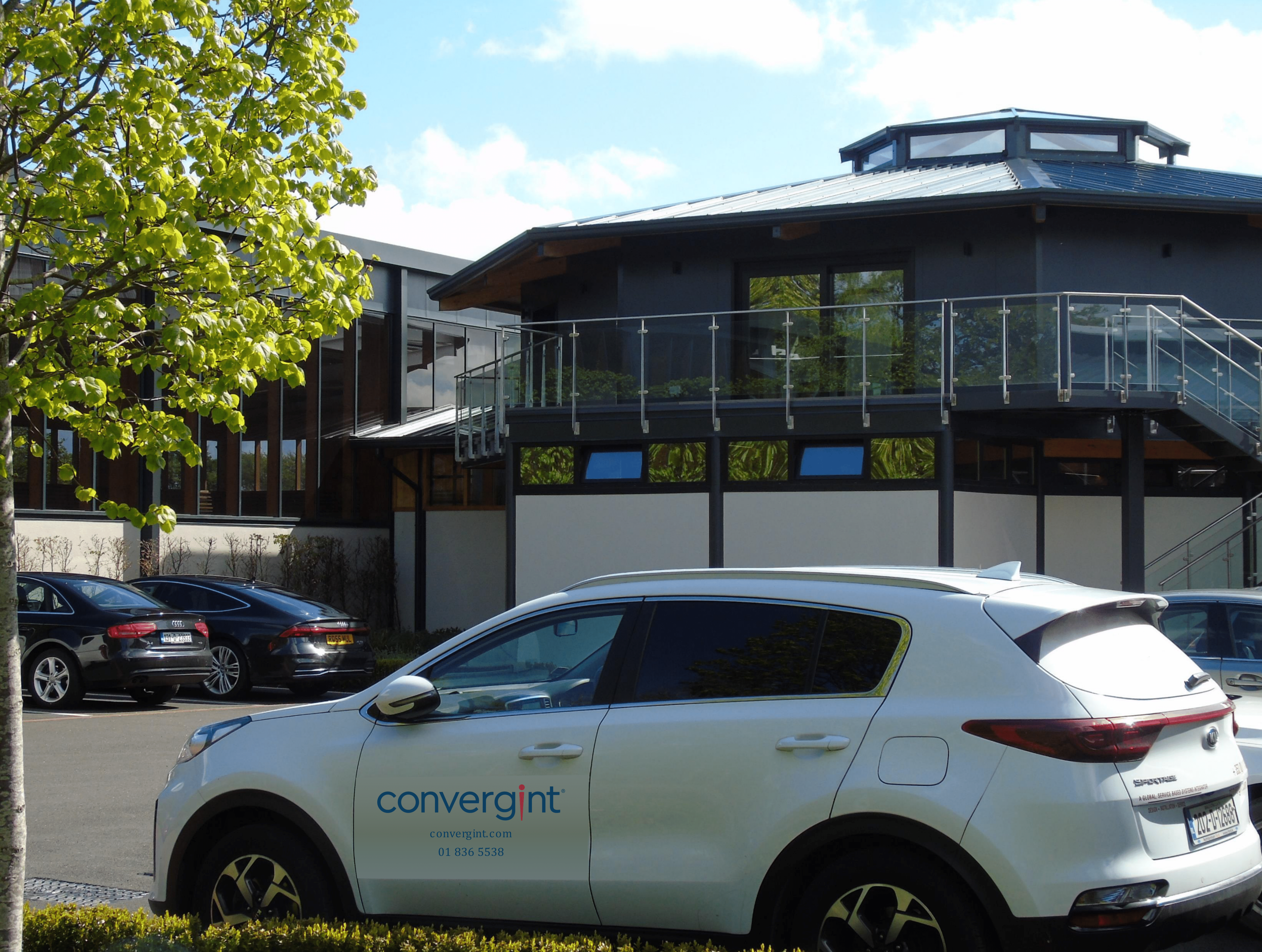 Convergint company van parked in front of main building