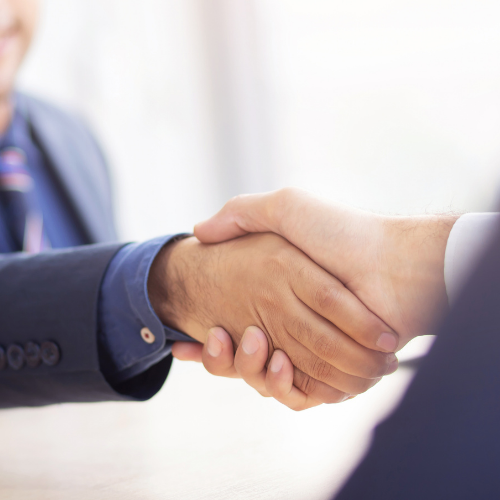 two people shaking hands