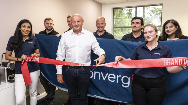 Ribbon cutting at new office event