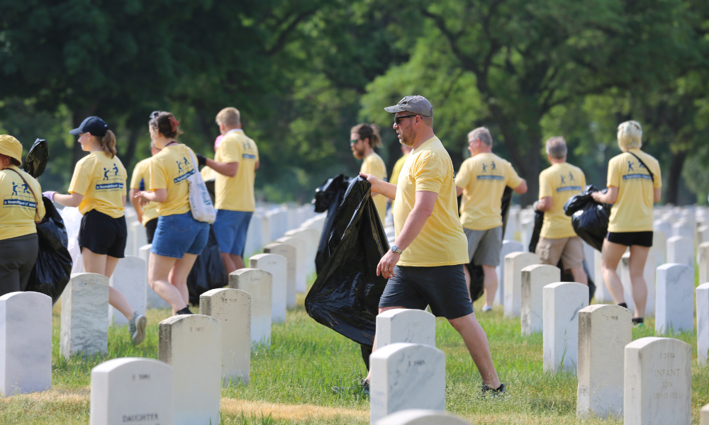 people walking in a cemetery