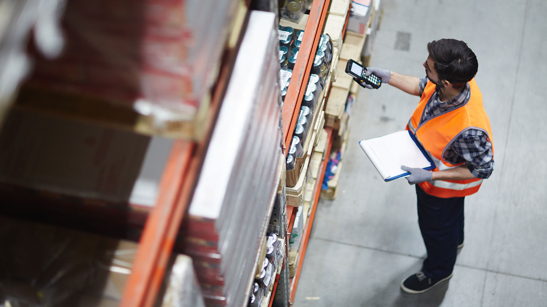 Employee checking inventory
